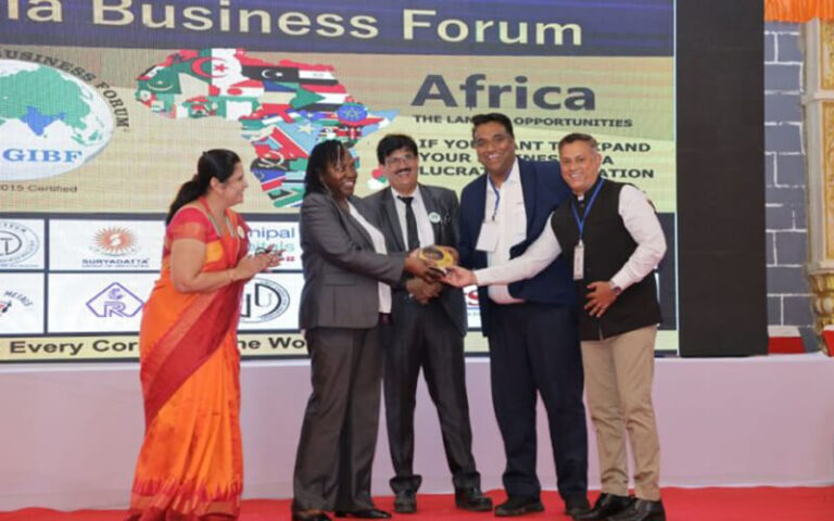 Dr. Arun Chakravarthy being felicitated by Amb. Irene Oloo during the International Programme India-Africa Business Conclave organized by Jitendra Joshi