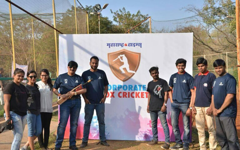 Sports Enthusiast Jitendra Joshi with his employees after playing a box cricket match
